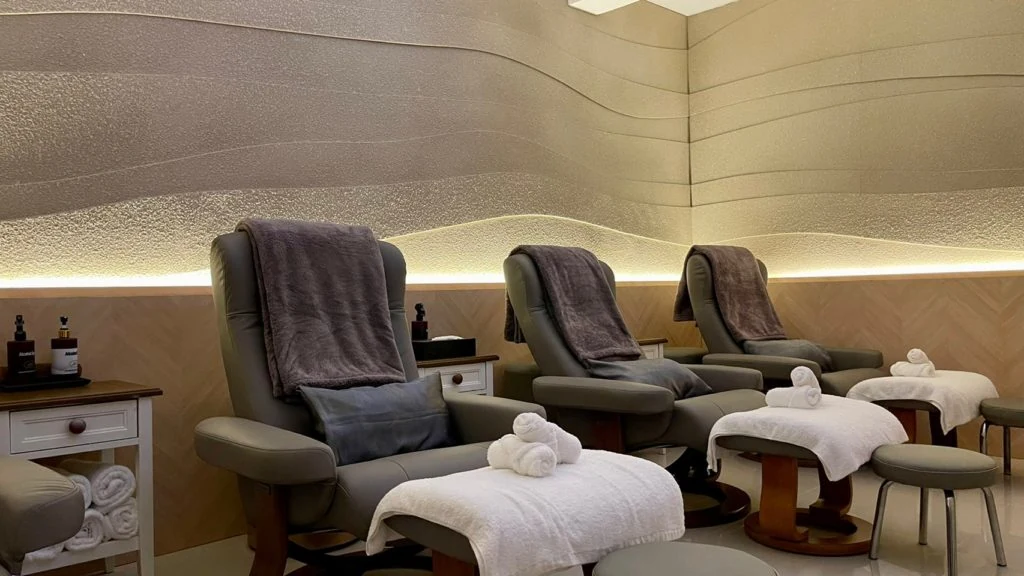 Row of reclining foot-massage chairs in the shared lounge at Lek Massage on Siam Square Soi 6, a massage in Siam Bangkok